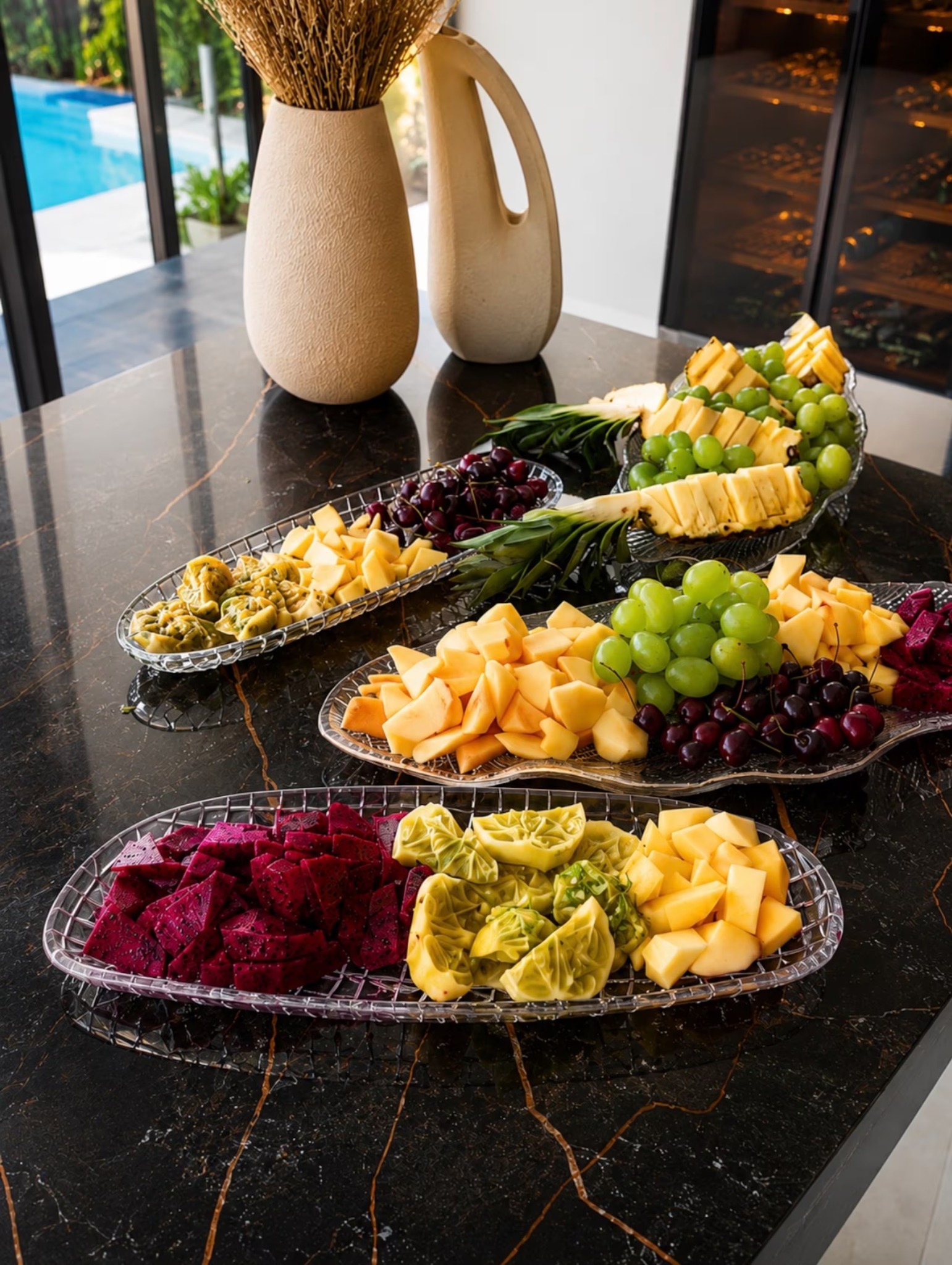 Platters of freshly sliced tropical fruit prepared at the villa